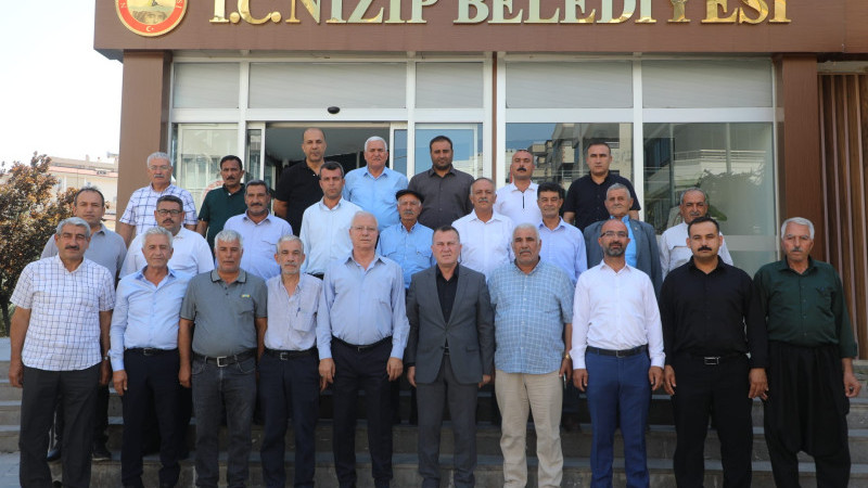 Doğan muhtarlarla bir araya geldi
